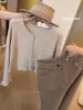 Cardigã de tricô oco de manga comprida estilo "old money" francês para mulheres, uma peça de outer wear de alta qualidade e elegante para a primavera, combinado com um top curto
