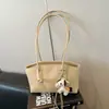 Bolso de axila para mujer estilo vintage para comercio exterior, nuevo modelo de verano 2026, bolso tote de alta calidad, versátil para ir al trabajo, bolso de mano y bolso de hombro