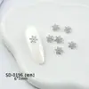 Pedras de Strass para Nail Art de Floco de Neve em Liga Metálica, Venda Quente Transfronteiriça, Bestseller de Inverno, Estilo 3D Versátil, Acessórios de Unha de Floco de Neve Dourados e Prateados