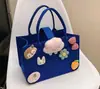 Bolso de Fieltro de Celebridad de Internet, Bolsa de Regalo de Alta Gama, Bolso Tote Pequeño de Fieltro de Dibujos Animados, Bolso de Mano Souvenir de Luna Llena