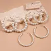 Brincos Redondos Geométricos com Pérolas Artificiais Europeus e Americanos, com um Toque Elegante e Sofisticado, Design Único e Minimalista