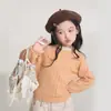 Roupa infantil Nuomi Wanzi para meninas, suéter de tricô com mangas raglan vazadas, estilo outono, blusa de tricô infantil solta e versátil