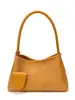 Bolso de mano de nicho estilo francés 2026 con un toque elegante, bolso tejido de moda de alta gama, bolso baguette simple de un solo hombro para llevar debajo del brazo