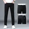 Pantalones de mezclilla grises, colección de primavera para hombre, corte recto ajustado, corte holgado, nuevo estilo para primavera y otoño, modernos pantalones de mezclilla lavada para hombre