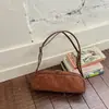 Bolso de gamuza para mujer 2026 nuevo otoño vintage Maillard bandolera para el trabajo y debajo del brazo bolso de mano de nicho