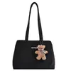 Bolso grande estilo universitario para mujer 2025 nueva moda versátil de un solo hombro simple para clase y desplazamientos bolso tote