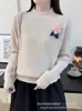 Nuevo suéter de punto tipo pullover para mujer, suave y acogedor, estilo coreano para otoño e invierno, con cuello semi-alto y decoración floral, top interior de corte holgado
