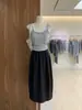 Diseño de Falda de Capullo Adelgazante de Gama Alta en Blanco y Negro Falda de Longitud Media con Cintura Elástica Falda de Línea A para Mujer
