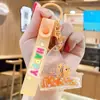 Llavero de pez dorado pequeño flotante para hombres y mujeres, exquisito, lindo, colgante de llavero de coche de botella flotante, colgante de bolso, pequeño regalo