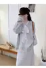 Suéter de punto con flores tridimensionales de encaje empalmado, falda de punto, conjunto de dos piezas, traje nuevo Otoño e Invierno 2025, Tendencia para mujer