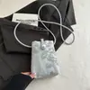 Nueva Bolsa Bordada Estilo Chino para Teléfono Móvil para Mujer Verano 2026 Nueva Elegante Moda Simple Casual Bolso de Hombro Cruzado