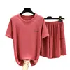 Camiseta de Seda de Gelo de Manga Curta para Mulheres Verão 2026 Novo Estilo Solta Casual Gola Redonda Conjunto Fino Slimming Visual Cor Lisa Conjunto de Duas Peças