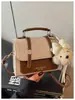 Bolsa Vintage de Nicho Bolsa Cambridge para Mulheres 2026 Nova Estilosa Fashionável Bolsa de Ombro Estilo Coreano Crossbody Pequena Quadrada