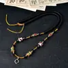 Cordón de Cuerda Hecho a Mano de Xizang Estilo Étnico Tarjeta de Buda Colgante Thangka Cadena Cuentas Negras Collar Retro Colorido Unisex