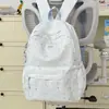 Mochila da moda estilo coreano com estampa de estrelas, uma opção estilosa e de alta qualidade para alunos do ensino fundamental e médio, oferecendo grande capacidade para o uso diário.