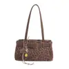 Bolsa Baguete de Mão com Estampa de Leopardo Niche Coreana para Mulheres Outono 2025 Nova Bolsa de Ombro Estilo Retrô de Alta Qualidade