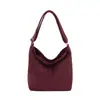 Bolso cuadrado pequeño de lujo ligero estilo coreano al por mayor para mujer, nueva colección otoño 2026, color liso con diseño de letras, bolso de hombro y bolso cruzado para ir al trabajo