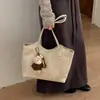 Bolso de mano simple de gran capacidad transfronterizo, textura versátil, bolsa tote, sensación de alta gama, nicho, apariencia retro, bolso de hombro único