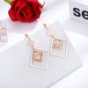 Pendientes creativos de moda con forma cuadrada de acero de titanio y diseño de cuadrados huecos exagerados, adornos de oro rosa para mujer.