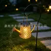 Nueva lámpara de tetera solar transfronteriza para jardín exterior, tetera hueca trapezoidal con forma de moneda de hierro forjado impermeable, lámpara de césped