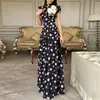 Roupas Femininas de Verão 2026, Vestidos Europeus e Americanos Transfronteiriços, Vestido Longo Moderno e Elegante de Corte Amplo com Estampa Floral