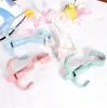 Colgador de bolso de cuatro garras giratorio perchero para corbatas de zapatilla perchero para bufandas chales sombreros perchero de plástico perchero colgar