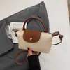 Bolso cruzado tejido de nicho de moda para mujer, bolso de paja, bolso de hombro de estilo casual, nuevo bolso de mano con bloques de color estilo coreano 2026