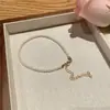 Pulsera de perlas de vidrio de moda nueva 2023 diseño de nicho femenino alto sentido simple pulsera Joker venta al por mayor de fábrica
