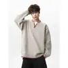 Suéter de punto de cuello en V con bloques de color, de punto falso de dos piezas, cosido a mano para hombre, marca de tendencia de invierno nueva, holgado y grueso, adecuado como capa interior