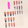 Uñas postizas ponibles largas puntiagudas rosa lunares punta francesa rayas negras de estrella incrustadas con pedrería pegatinas de uñas postizas desmontables