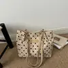 Nova bolsa de ombro de bolinhas 2026, grande capacidade, adequada para o trabalho, estilosa e versátil, bolsa tote casual para mulheres