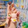 Nuevo Dibujo Animado Lindo Mascota de Arroz Animal Pequeño Llavero Lindo de Moda Muñeca de Resina Llavero de Niña Colgante para Bolso