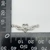 Venda Direta da Fábrica Pulseira com Pingente de Laço de Liga DIY Charme Acessório Pequeno para Roupas Femininas Puxador Prateado