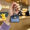Mini bolso colgante para el hogar, bolso pequeño, bonito bolso, nuevo, a la moda, con colgante, boca, sobre rojo, bolso para auriculares, llave de coche