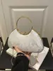 Bolso de mano de diseño de nicho estilo francés para mujer, bolso de noche europeo y americano, bolso bandolera de cadena de moda, bolso de mano, bolso tote para salir