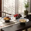 Elegante y creativa bandeja de té y pasteles de pie para uso doméstico, plato de cerámica para frutas y pasteles, juego de té estilo Zen y bandeja de servicio para invitados