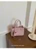Bolso Cubo Portátil Súper Popular Transfronterizo para Mujer 2026 Nueva Moda Bolso Cruzado Versátil Estilo Coreano Nicho Bolso de Hombro para Viajes