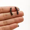 Nuevos aretes de acero inoxidable de comercio exterior con diseño simple de copo de nieve, nota musical, corazón, mariposa, perro mascota en stock para venta al por mayor