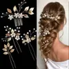 Acessórios de cabelo de noiva mais vendidos transfronteiriços, tiara de flor de pérola, pente de cabelo feito à mão, conjunto de grampos e palitos de cabelo para fotografia de viagem de casamento