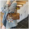 Bolso de axila nuevo de estilo coreano 2025, de nicho, para el día a día, para mujer, retro, elegante y de gran capacidad, un bolso pequeño cuadrado para el hombro
