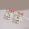 Brincos de Flor de Cerejeira Branca com Laço Rosa Estilo Francês Brincos de Chá Super Fada Novos Brincos Primavera e Verão 2025