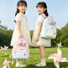 Moda de nicho estilo coreano, minirmochila minimalista con estampado de lunares y estrellas, perfecta para salidas infantiles y desplazamientos, elegante y ligera