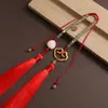 Nuevo colgante Xiangyun de alta calidad en oro arenoso para interior de coche, cerradura Ruyi Ping An, decoración para espejo retrovisor de coche, venta al por mayor