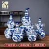 Garrafa de vinho em forma de cabaça de porcelana azul e branca de Jingdezhen, jarro de vinho de cerâmica, pote doméstico selado para armazenamento de vinho, jarro para infusão de vinho, presente