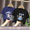 Camiseta de manga larga a rayas de algodón puro para niño, estilo dos piezas falsas, ropa de otoño, nuevo modelo primavera y otoño 2026, camiseta básica para niño pequeño