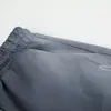 Pantalones de pierna ancha con hoja curva desgastada teñida y pintados con spray estilo páramo para hombre, marca moderna, estampado floral lateral, holgados, casuales, largos