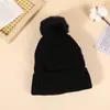 Gorro de punto jacquard cálido acolchado para exteriores con pompón de pelo protección para orejas gorro para el frío moda gorro de lana al por mayor