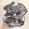 ¡Estilo de Cuatro Capas! Goma para el pelo pequeña de encaje floral ~ Cuerda para el pelo de botón de flor de falda de alta gama retro francesa