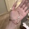 Pulseira Esmaltada com Contas de Borboleta Super Fada Fresca Doce Suave Feminina Versátil Temperamento Feminino Joia em Camadas