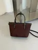 Bolso tipo cubo de alta gama para mujer, nueva colección de otoño 2026, versátil para el uso diario, gran capacidad, bolso de hombro, bolso cruzado